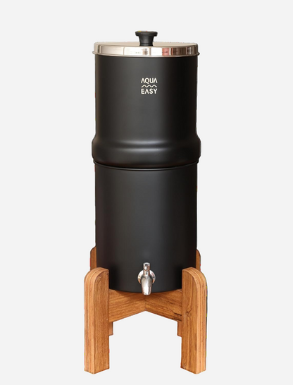 Black water filter with wooden stand on a white background